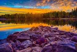 Purple sky landscape with rocky area