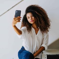 Lady with phone in air